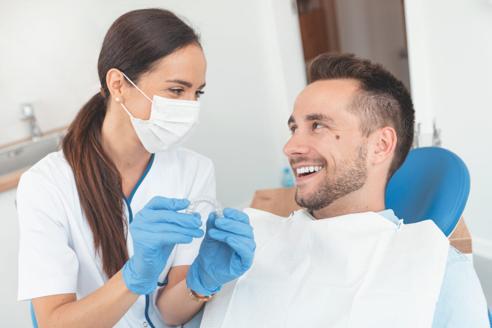 Dentist explaining treatment to patient