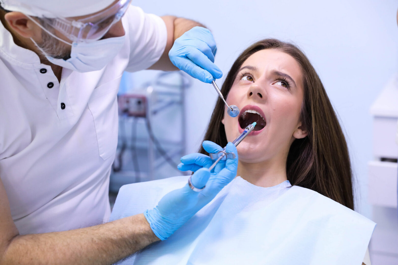 Woman receiving dental check-up