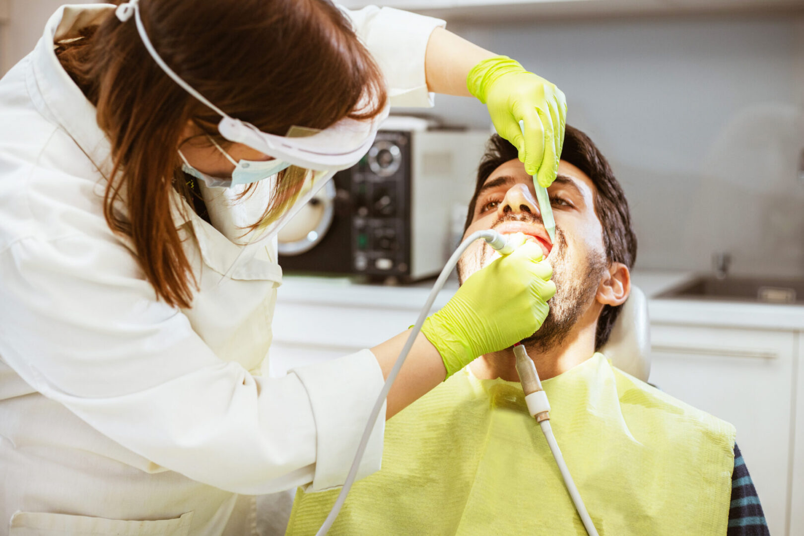 Dental checkup with protective gear
