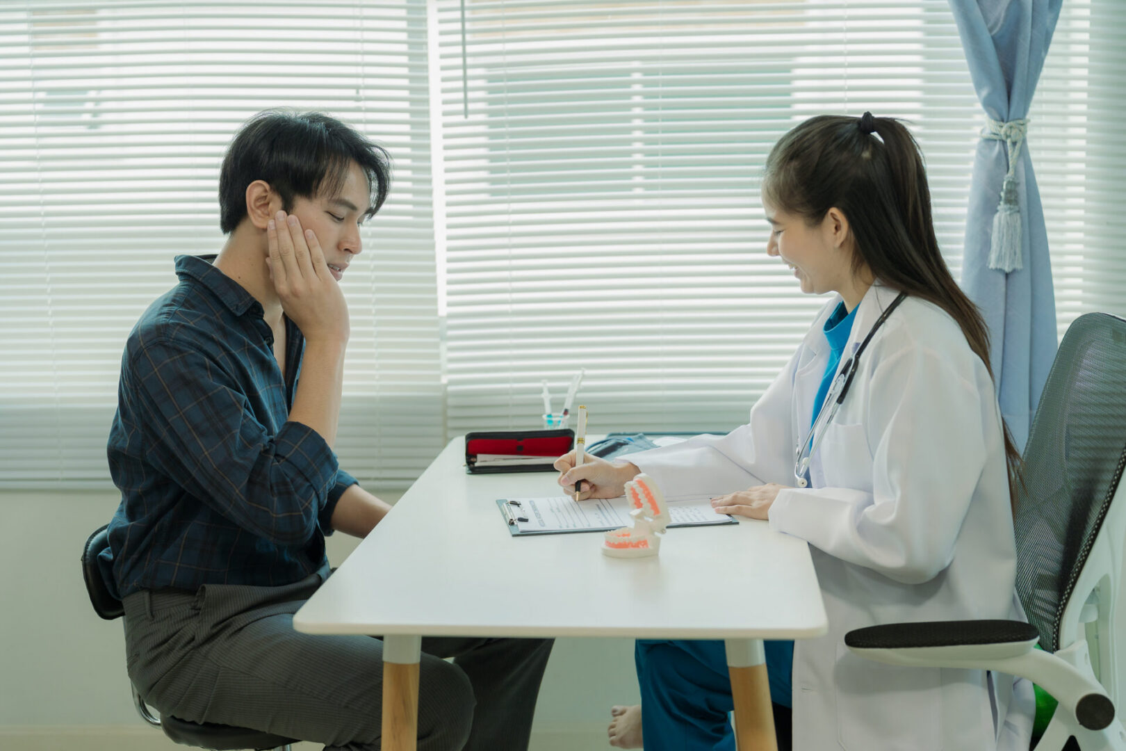 Patient consulting with a doctor