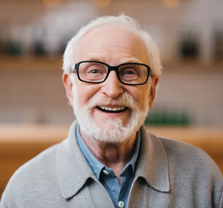 Smiling elderly man with glasses