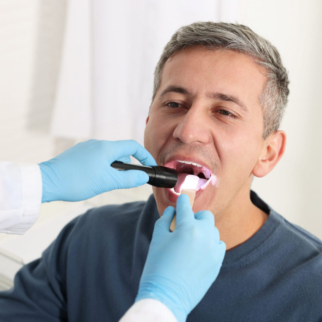 Patient receiving oral examination
